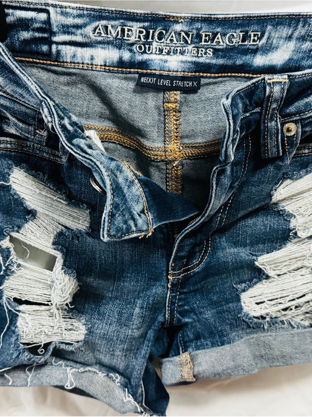 American Eagle Women's Distressed Blue Denim Shorts Next Level Stretch size 0 23